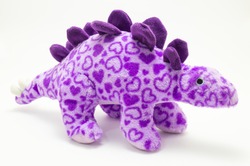 Purple Dinosaur. soft toy on a white background