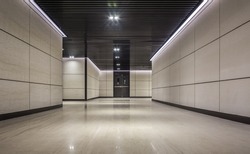 Empty underground corridor under commercial building