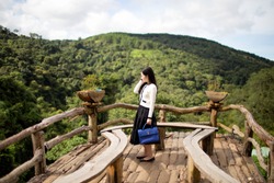Young woman traveling at Hoa Son Dien Trang eco-tourism, a popular tourist destination in Da Lat, Lam Dong Province, Vietnam