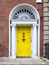 A famous yellow painted Georgian door in Dublin, Ireland