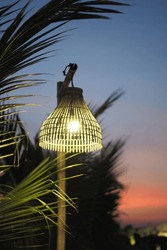 Handmade lamp made from bamboo material.