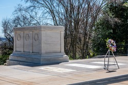 A wreath stands in front of the Tomb of the Unknown Soldier in Washington DC's Arlington National Cemetery.