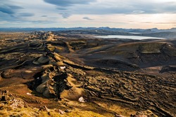 Lakagigar volcanic fissure at sunset illuminated by golden light, Iceland