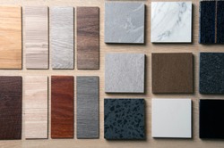 Sample of materials construction on wood background. Materials use for Interio designer. Home construction decorate room with luxury constructions set. Sample of Concretes and Wood laminate vinyl.