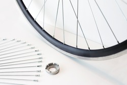 rim and spokes of a bicycle wheel, wheel lacing, close-up on an isolated background