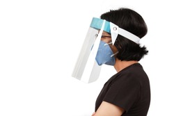 A girl wear mask and face shield to protect colona virus or Covid-19