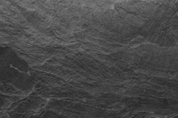 Dark grey black slate background or texture. black stone