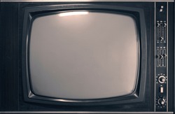 Old,  aged  television isolated  on gray wall background, retro vintage tv style. empty white screen. 