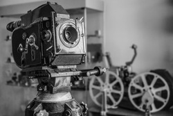 Old style movie projector, still-life, close-up. retro vintage tape video camera. antique film projector