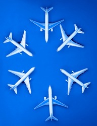 six Air plane toy isolated on blue  background. 6 airplanes. 