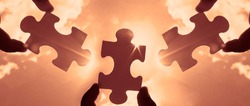 three hands of businessman to connect couple 3 piece with sky background.Jigsaw alone wooden puzzle against sun rays.one part of whole. symbol of association and connection.business strategy.