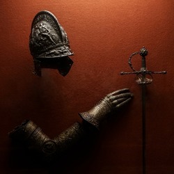 medieval armor made of wrought iron. knight helmet iron medieval age armor, decoration in historical museum. 