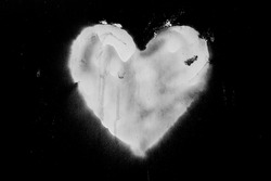 Spray Paint white Heart isolated on black Background. Symbol of Love for Happy Women's, Mother's, Valentine's Day, Birthday greeting card. Street style. painted heart sign on dark backdrop