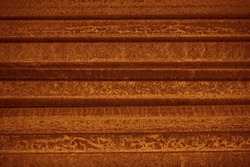 metal background of rusty Steel Construction Beams. Row of iron Beams. 