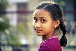 Beautiful Indian teen girl posing to the camera.