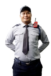 Middle old Asian security guard make saluting, Asian security guard isolated on white background. Male security guard with portable radio transmitter. A security guard with portable radio transmitter.