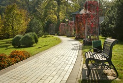 Beautiful park with pathway, arbors and benches