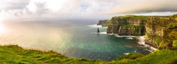 Beautifull wild landscape of Cliffs of Moher in Ireland. Hiking trip on summer holidays.