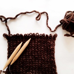 needle and thread knitting pattern hand craft pattern symbol brown yarn ball