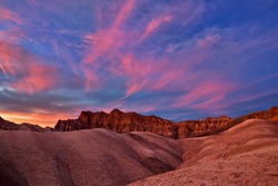 After sunset with pink clouds at Golden Canyon in Death Valley National Park
