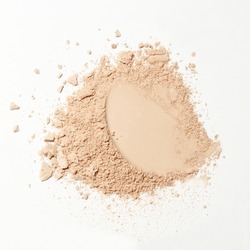crumbled natural powder make up on white background