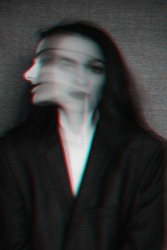 abstract black and white portrait of a girl with mental disorders and glitch effect with blur