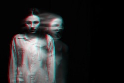 blurry scary portrait of a witch ghost girl in a white shirt. Black and white with 3D glitch virtual reality effect