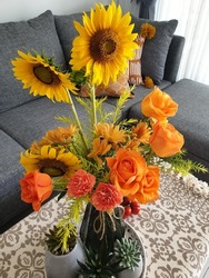 Beautiful and Vibrance Sunflower and Roses in Dining Room