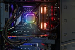 Close-up and inside high performance Desktop PC and Cooling system on CPU socket with multicolored LED RGB light show status on working, interior on Computer PC Case and DIY, technology background