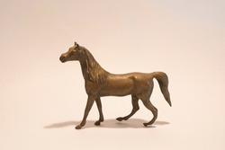 Small bronze Arabian horse statue.