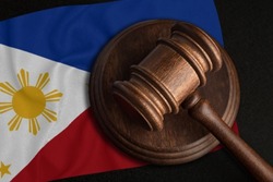 Judge Gavel and flag of Philippines. Law and justice in Republic of the Philippines. Violation of rights and freedoms.