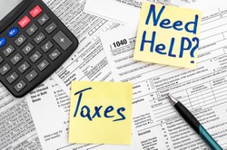 Need help and taxes text on stickers with tax forms. Assistance with filing tax form and calculation.