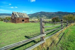 Canadian landscape of old rustic farm building on a ranch in the Nicola Valley near Merritt, British Columbia, Canada.