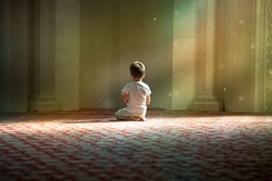 praying child in the White Mosque in Bulgar