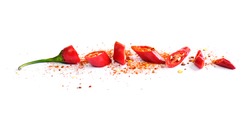 Red chili pepper, cut into pieces and isolated on white background. Hot spice, red chili pepper and chili powder. 