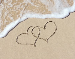 Two hearts in the sand          