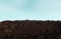 Soil or dirt section with sky