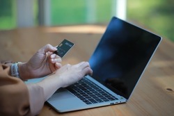 Hand of woman show creditcard for shopping online