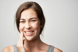 woman teeth hurt tooth decay                             