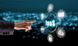 IaaS - Infrastructure as a service, Businesswoman hand touching Infrastructure as a Service icon on VR screen, networking and application platform. Internet and technology concept.