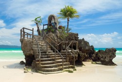 Willys Rock, situated on the famous White Beach, is one of the most recognizable landmarks of Boracay Island, Philippines
