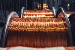 Copper wire cable production in coils, metal steel industrial plant.
