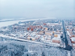 Winter cityscape Tomsk Siberia snow forest, Russia aerial top view.