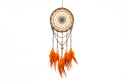 Dream catcher with feathers threads and beads rope hanging. Dreamcatcher handmade isolated on white