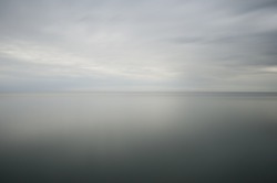 long time exposure of the ocean, soft water and cloudy sky