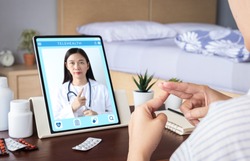 deaf mute patient use video conference, make online consultation by sign language with doctor on tablet application about illness, medicine via vdo call. Telehealth, Telemedicine, online hospital