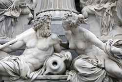 Detail of Pallas-Athene fountain in front of Austrian parliament, Vienna, Austria. Sculptures represent rivers Danube and Inn