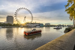 London eye known as millennium wheel at sunrise: London,England-March 2016