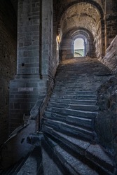 Inner stairway at Sacra di San Michele, one of the most famous landmarks in Piedmont region, Italy