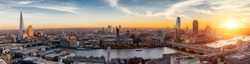 View to the skylne of London along the Thames river during sunset time, United Kingdom